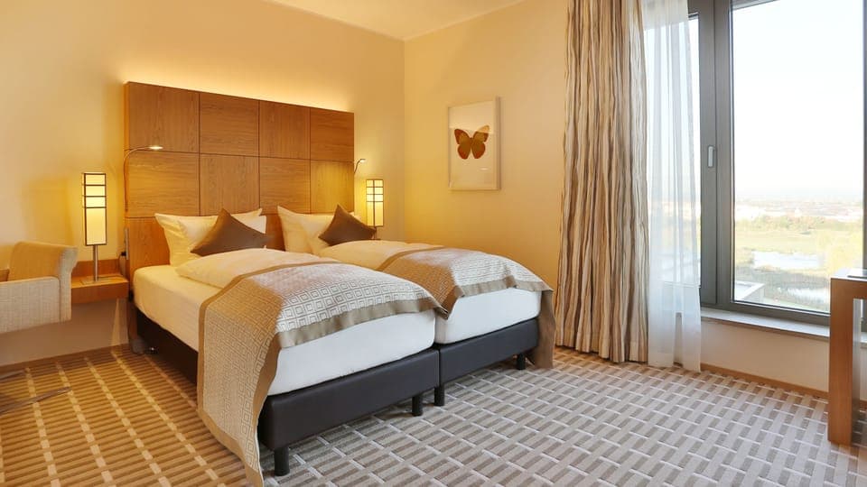 Hypo-allergenic bedding, in-room safe, desk, laptop workspace