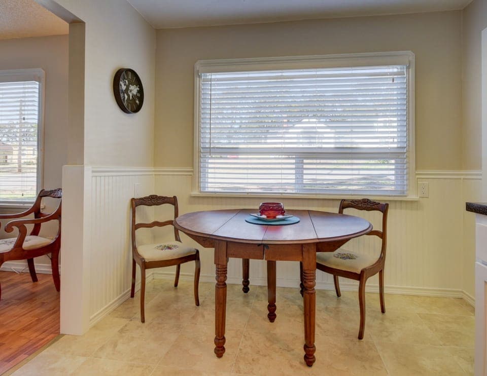 dining table expands & easily moved to area next room for guests & celebrations 