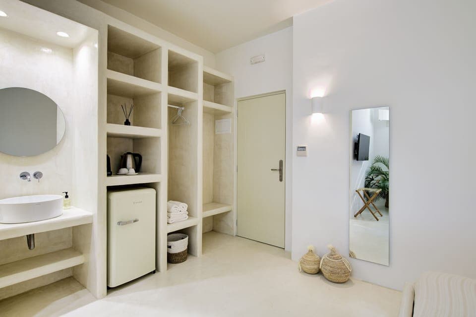 The Skylight semi - basement room | Premium bedding, down comforters, memory foam beds