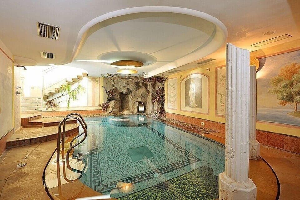 Indoor pool, open 2:30 PM to 7:30 PM, sun loungers