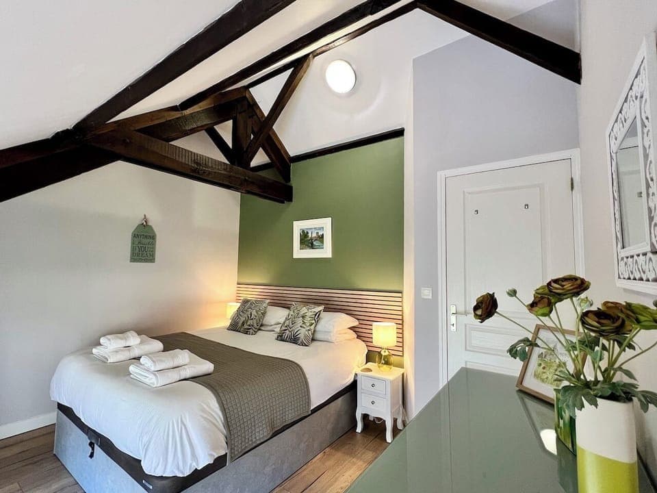 Our Garden Room with beautiful beams and lovely views of the private garden