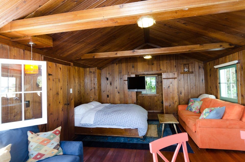 Comfy queen size Murphy bed.  TV swings into room so you can watch in bed.