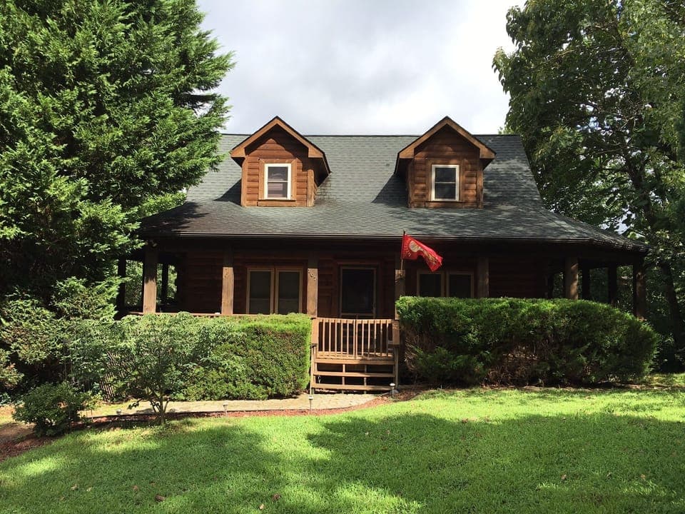 Silver Tree Cabin, rear decks with views and 3 sided cover porch for relaxing.