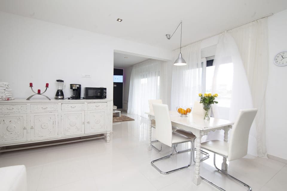 Two-Bedroom Apartment with Sea View and Balcony | Living area | 32-inch TV with digital channels, pay movies, streaming services