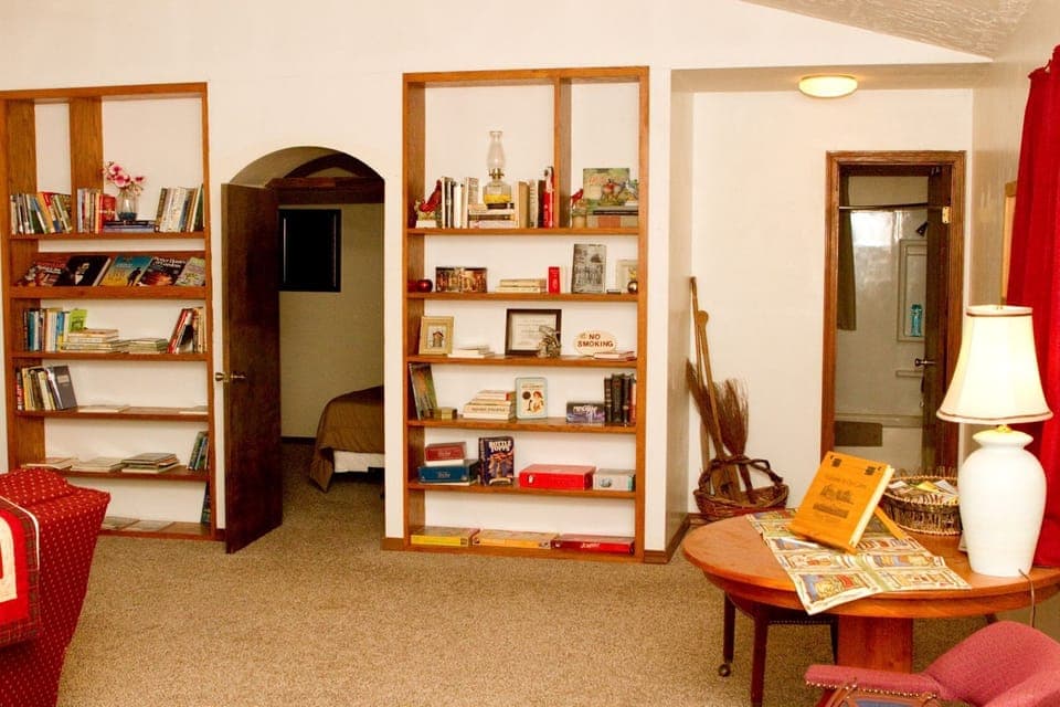 Upstairs bookshelves and table