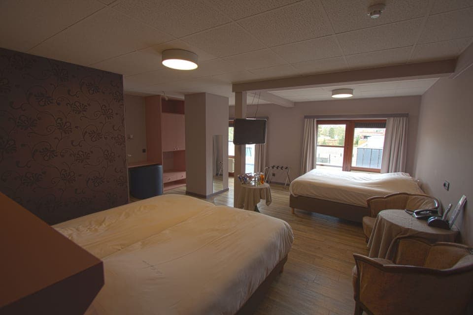 Quadruple Room | Minibar, desk, iron/ironing board, free WiFi