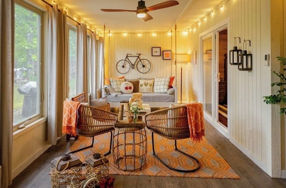 Relax in our sunroom with a swing bed