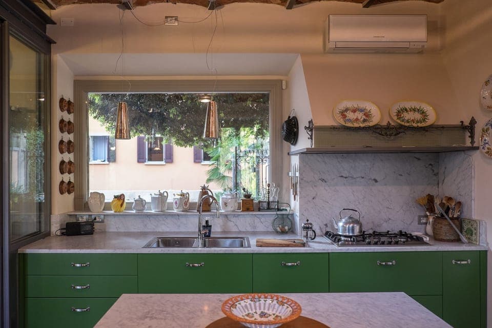 The roomy gourmet kitchen invites experimentation and multiple cooks!