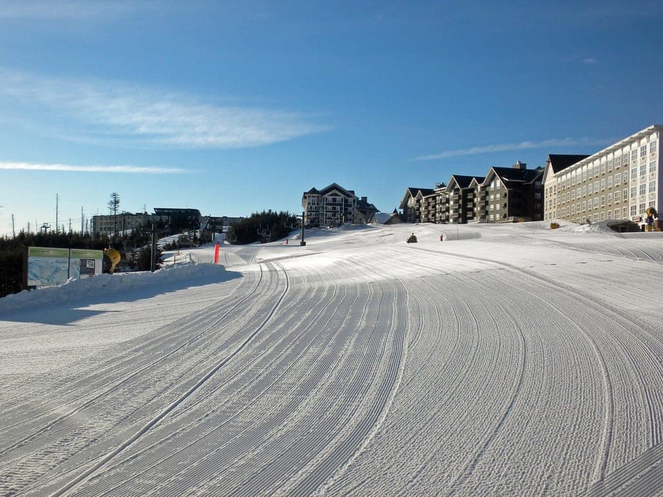 Your morning wake up call. Is the coffee ready?  The building on the right of this photo is Expedition Station.