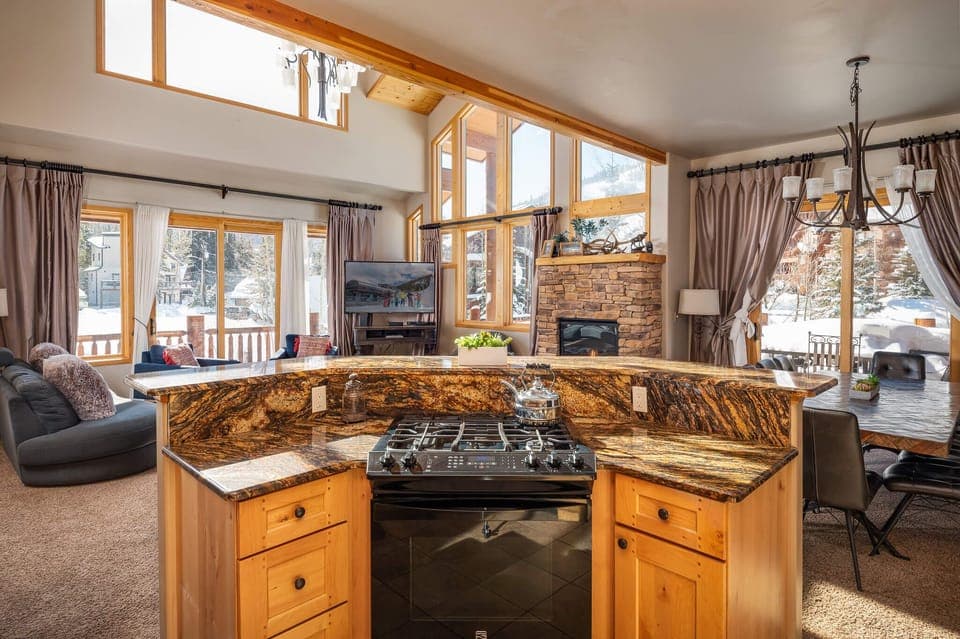 View into the main living area and dining area from the kitchen