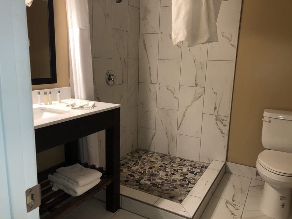 Deluxe Room, 2 Queen Beds, Non Smoking | Bathroom | Free toiletries, hair dryer, towels, soap