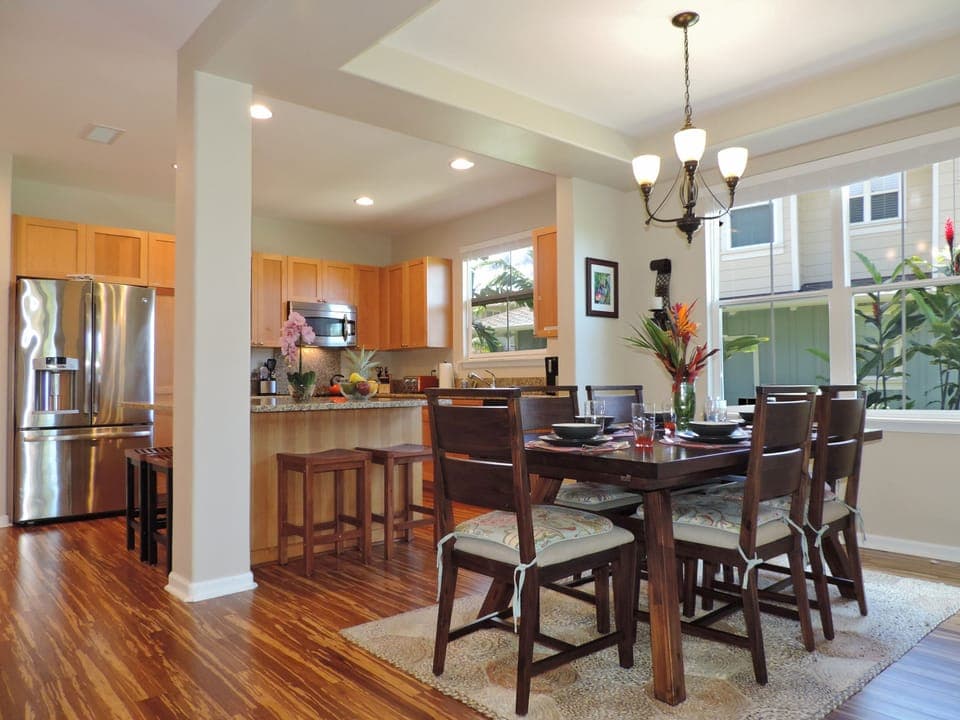 Sophisticated dining area with seating for six, perfect for shared island feasts