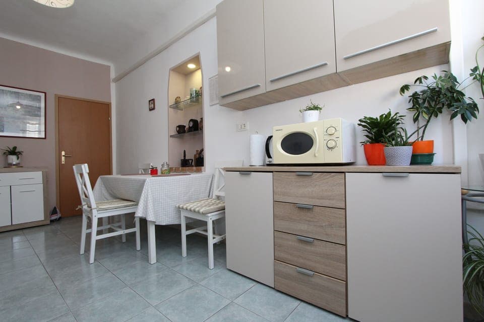 Apartment, 1 Bedroom | Private kitchen | Fridge, electric kettle, toaster, freezer