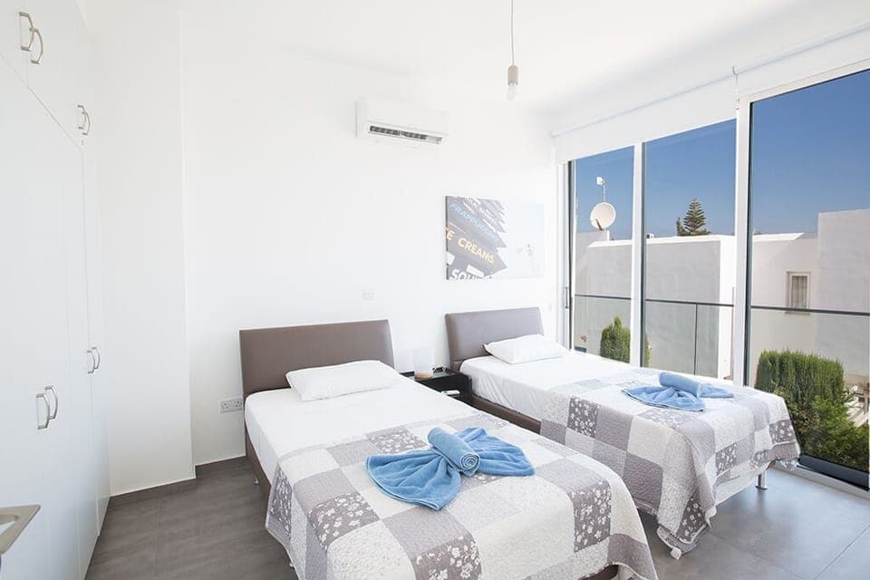 First floor bedroom 5 with two single beds