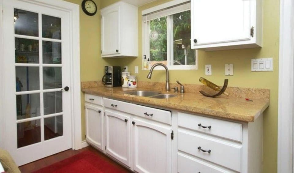 Kitchen - Granite countertops and stainless steel sink, coffee maker