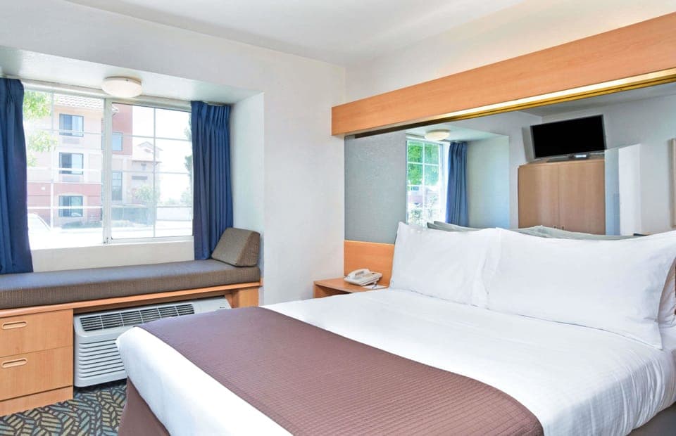 Desk, blackout drapes, free cribs/infant beds, rollaway beds