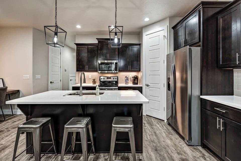 Kitchen Island - The Kitchen Island comfortably seats 3 adults and creates a great space for serving and preparing meals.