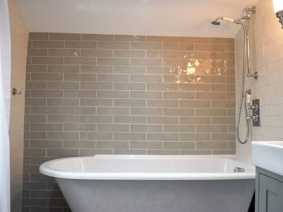 Tiled bathroom | Cosy Cottage, Portinscale, near Keswick