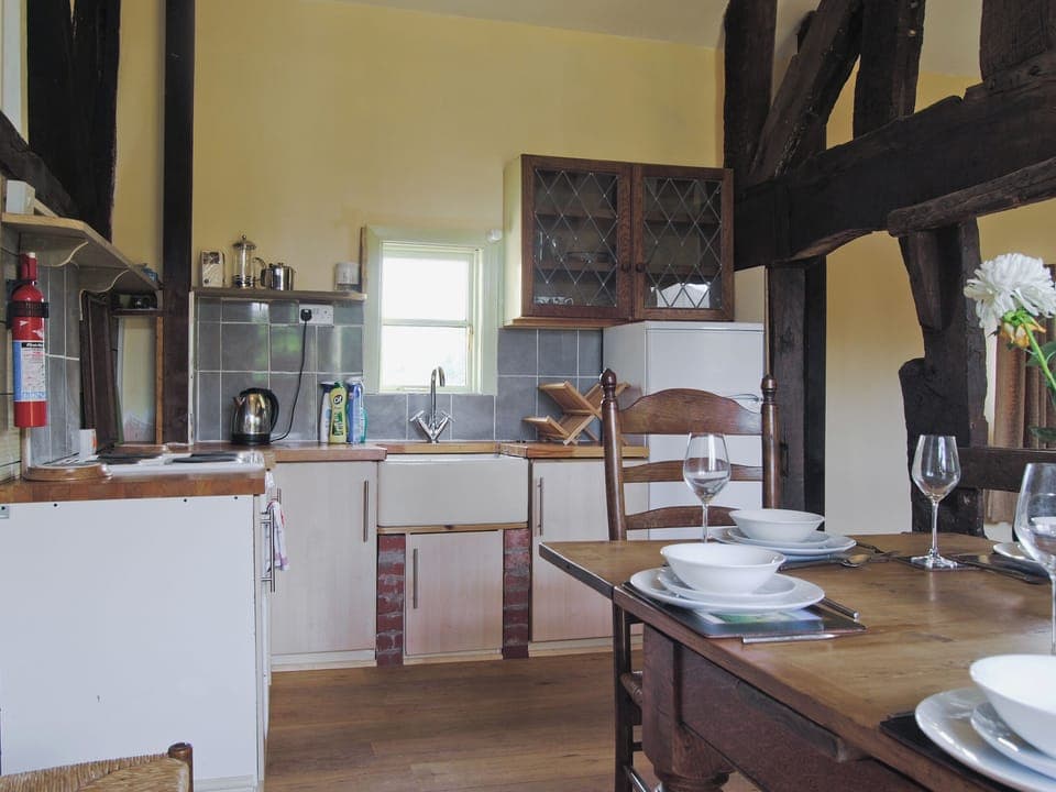 Kitchen/diner | Hirros Hall Longhouse, Llanerfyl, nr. Welshpool