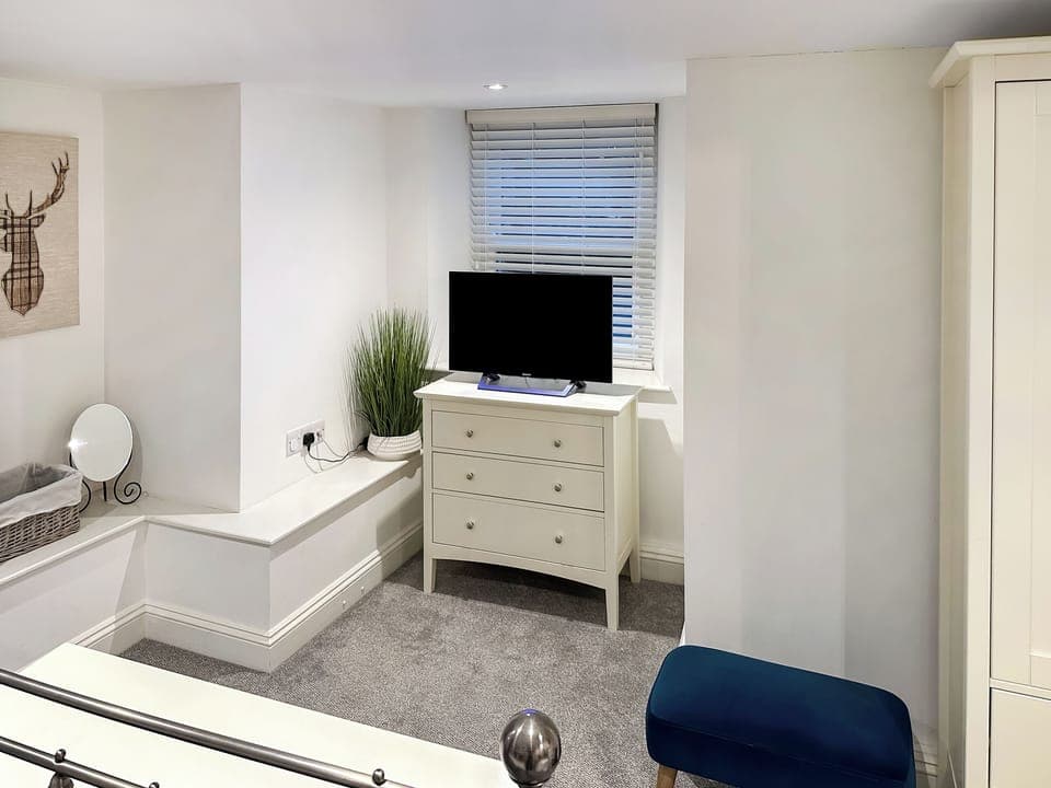 Spacious dressing area within lower ground floor double bedroom | Breckenridge, Keswick