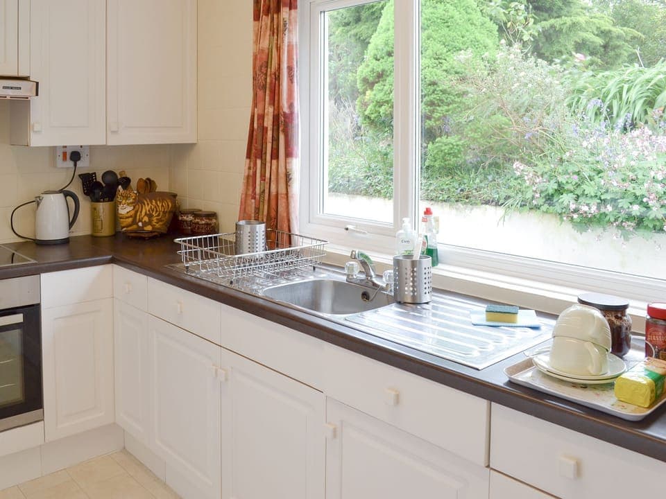 Well-equipped kitchen with garden views | Tucstan, Constantine, near Falmouth