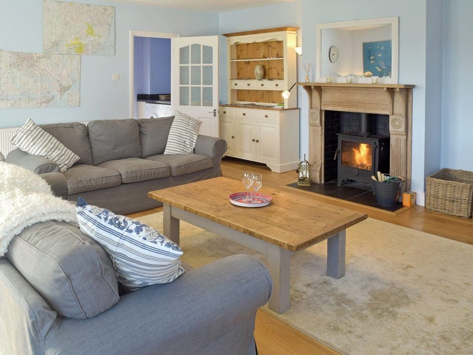 Generous lounge with wood-burner | Granary Cottage, Tattingstone, near Ipswich