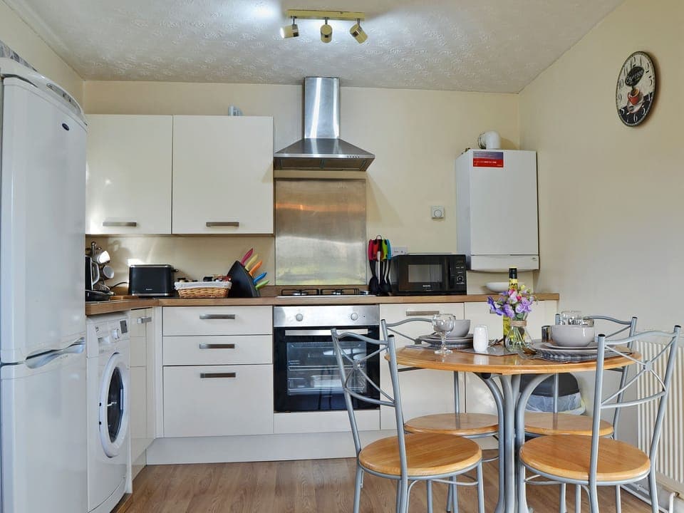 Well presented kitchen/dining area | The Meadow Flat, Shanklin