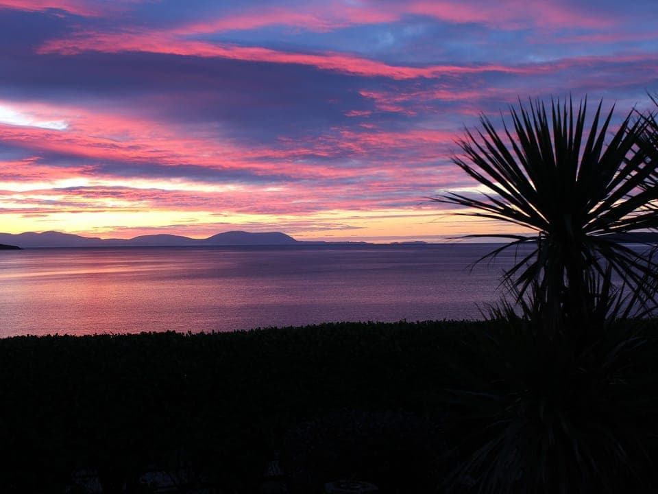 Gorgeous sunsets can be enjoyed from the property | Beach Cottage, Clachangarbh, Gairloch