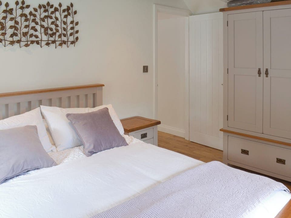 Warm and inviting double bedroom | Bluebell Cottage, Over Stowey, near Taunton