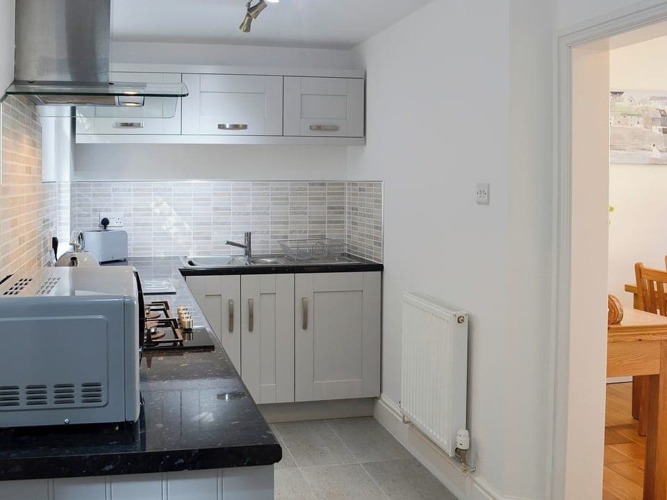 Well-equipped contemporary kitchen | Llwynon Cottage, Llandudno