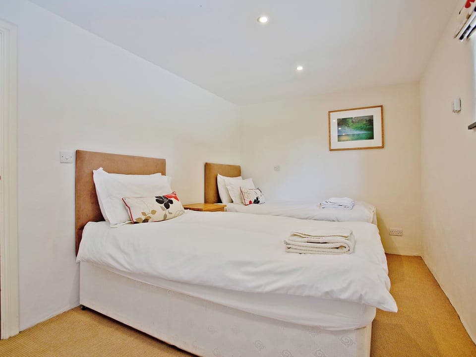 Twin bedroom | Lower Trevorder Barns - The Mill House, Mount, nr. Bodmin