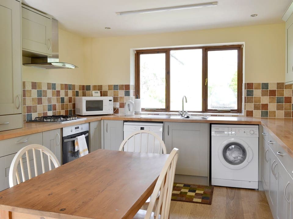 Well-equipped fitted kitchen with dining area | The Coach House, Bootle, near Millom