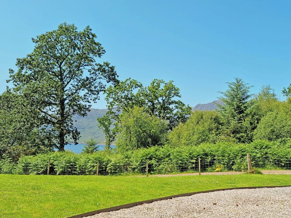 Spacious lawned garden overlooking stunning scenery | Allt Beag (Little Streams), Achintraid, near Lochcarron