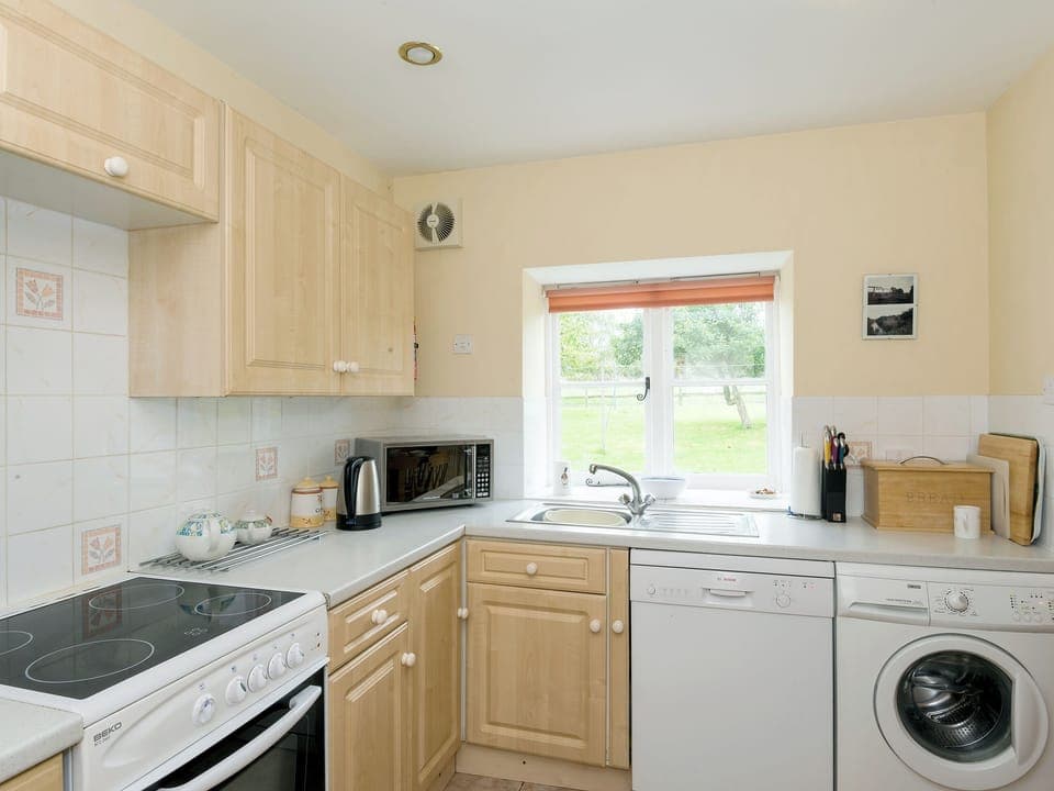 Well equipped kitchen | The Stable, Foxham, near Chippenham