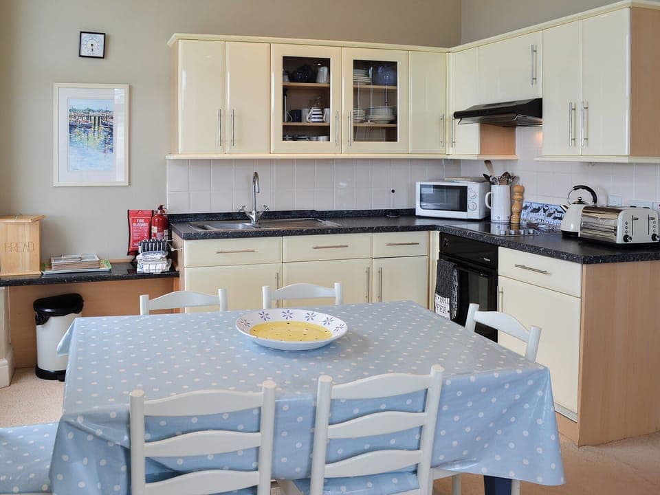 Dining and adjacent kitchen area | Tamarisk, Coverack, near Helston