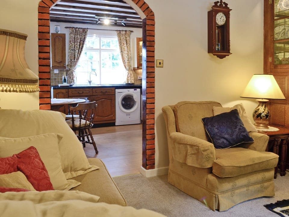 Comfy lounge adjoins kitchen and dining room | Y Bwthyn, Bala