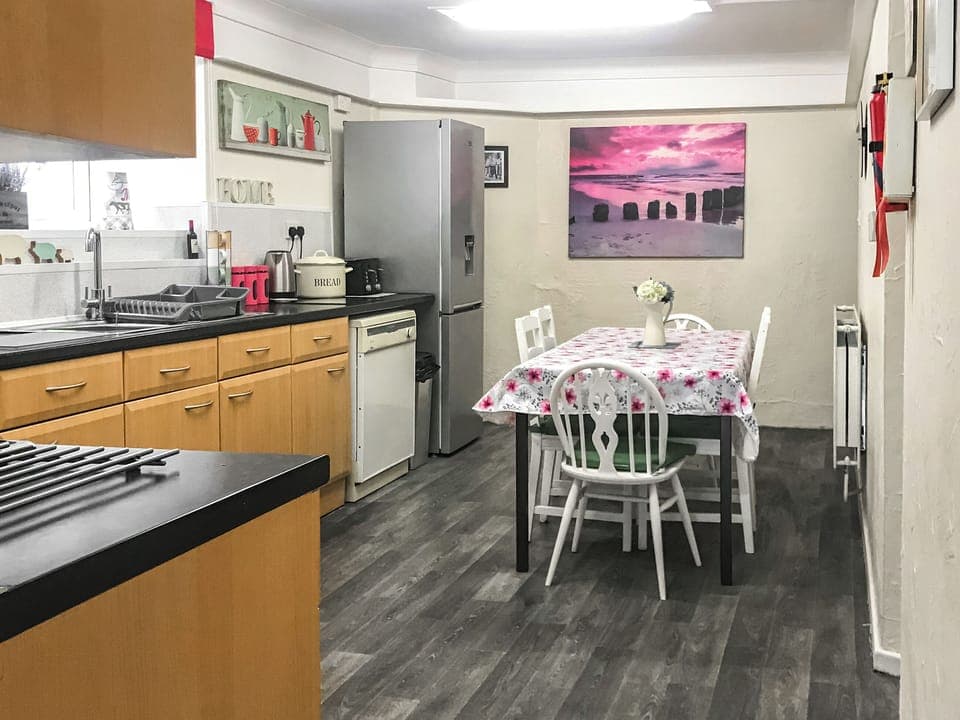 Informal dining area within kitchen | Bryn Euryn Cottage, Rhos-on-Sea, near Colwyn Bay