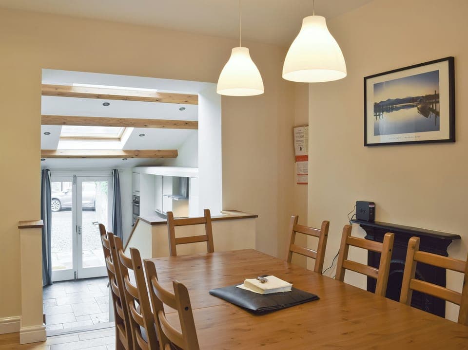 Open plan design connecting dining area to kitchen | Falcon Crag, Keswick