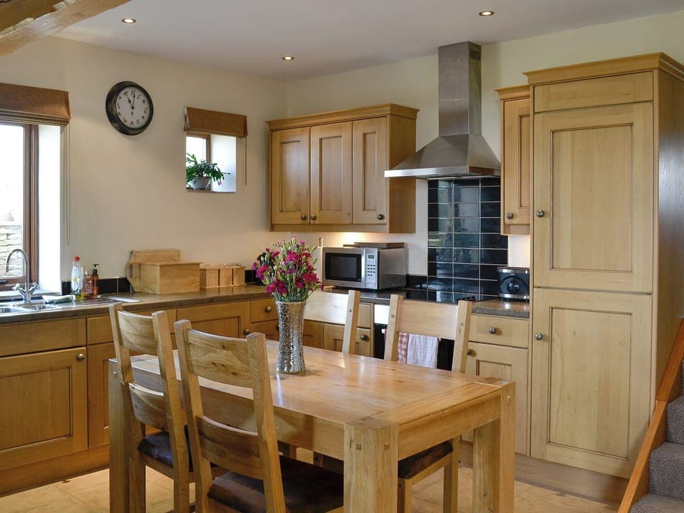 Well equipped kitchen/ dining area | Hutter Hill Barn West - Hutter farm, Silsden near Skipton