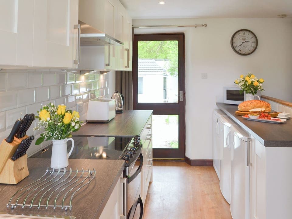 Kitchen with garden access | Sunset - Horselake Farm Cottages, Cheriton Bishop