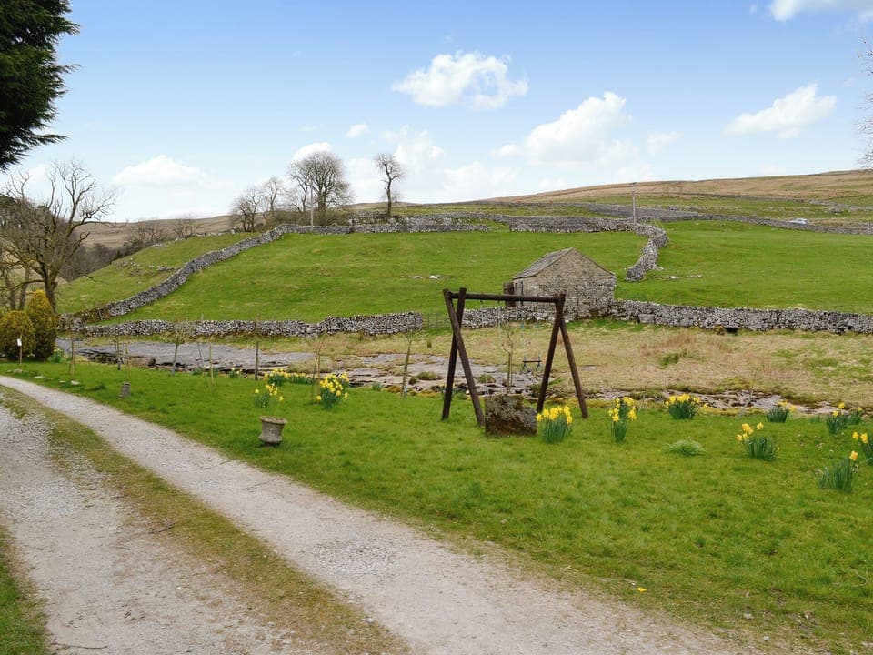 Children&rsquo;s play area and the lovely countryside | East House Farm and Wood&rsquo;s Barn, Beckermonds, near Kettlewell