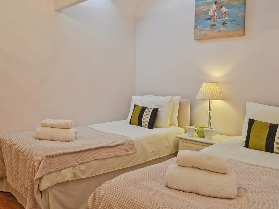 Zip-link beds set as twin | The Orangery, Bideford