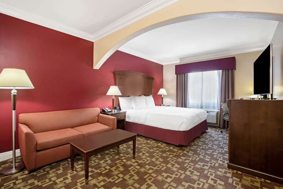 Suite, 1 King Bed, Non Smoking | Premium bedding, desk, iron/ironing board, free WiFi