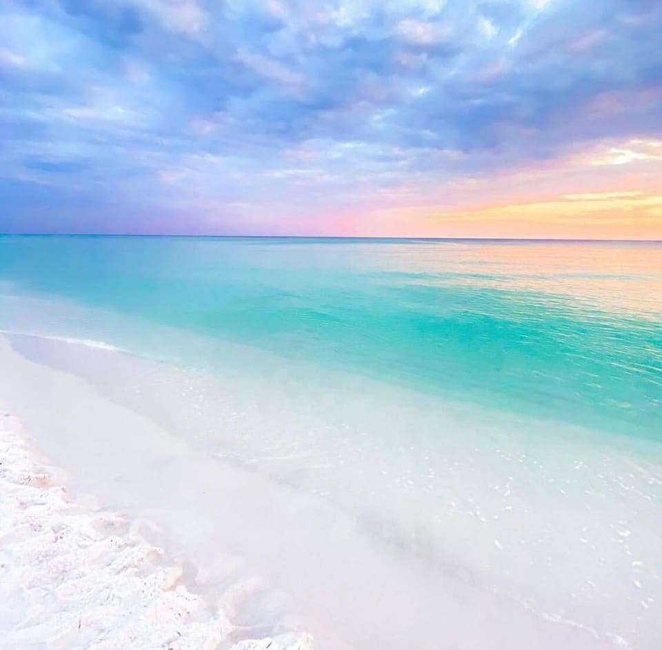 Stay with us! Lovely condo only steps from beautiful beach (across parking lot)