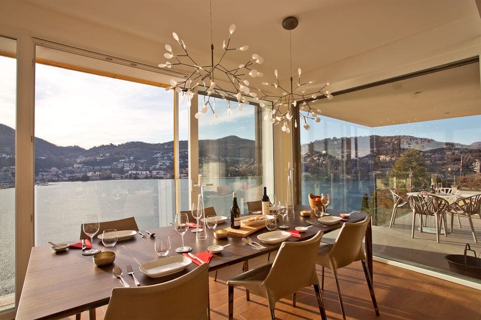180 degree lake view dining inside and out at our Executive Penthouse Como Condo