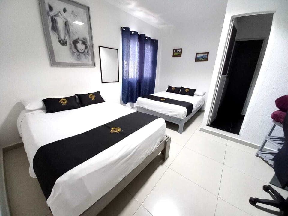 Standard Quadruple Room, Non Smoking (Cozumel) | Hypo-allergenic bedding, desk, laptop workspace, blackout drapes