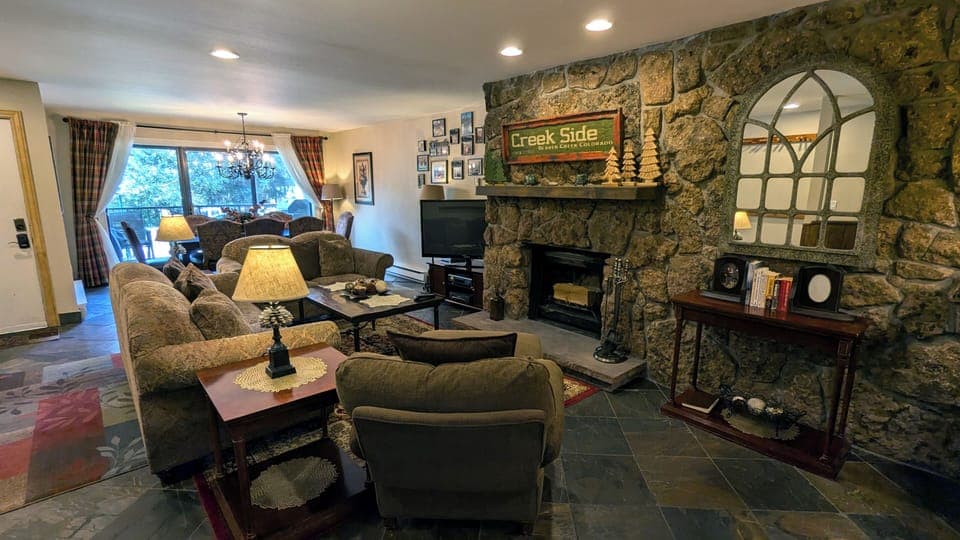 Beaver Creek West Condo #11 living room with wood fireplace
