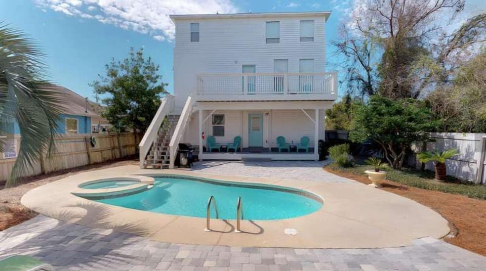 Soak in your very own private pool with easy access to the beach! 