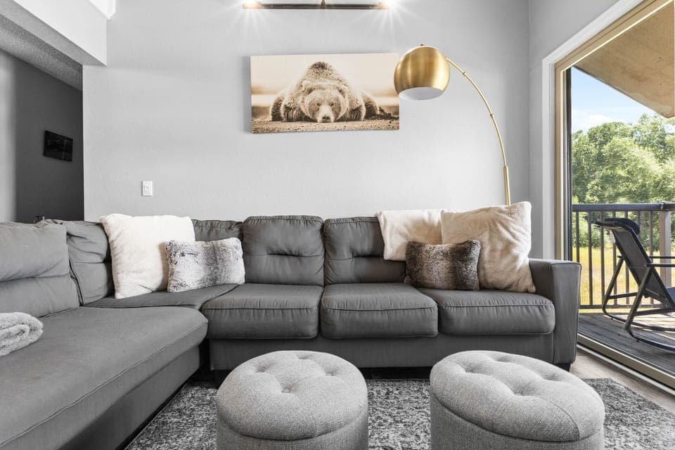 Large & Cozy Couch - Gray Sectional Sofa with decorative pillows + Two light Grey Tufted Storage Ottomans