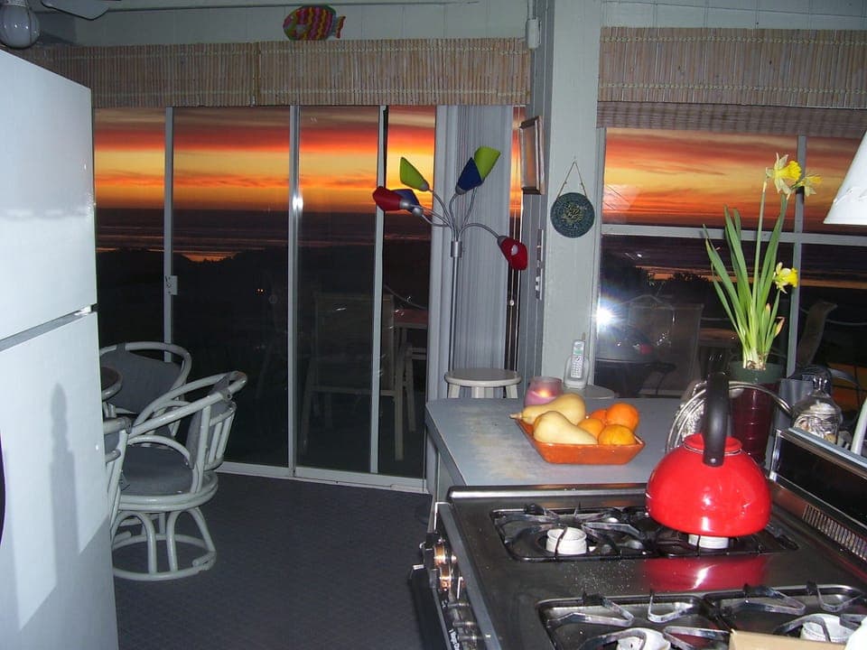 Kitchen at sunset, no dishwasher and small, but what a view